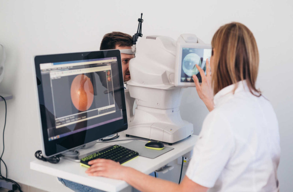 A patient having their eye health checked for signs of glaucoma during an eye exam